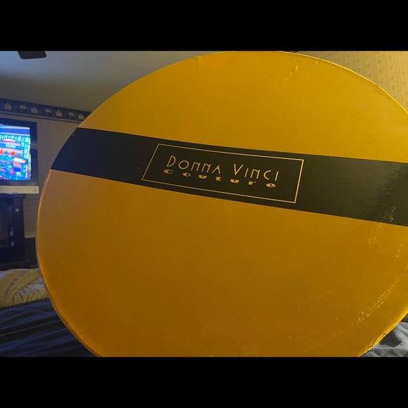 This is a Never Worn Donna Vinci Hat! It is black and silver with crystals! - Picture 3 of 4